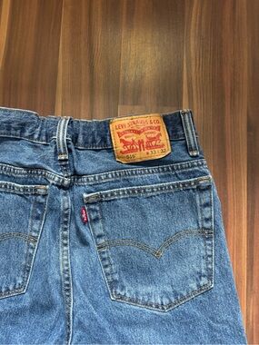Levi's Women's Boyfriend Jeans in Medium Blue with Tan Patch